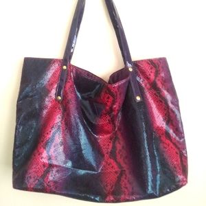 Guess fuchsia and purple tote